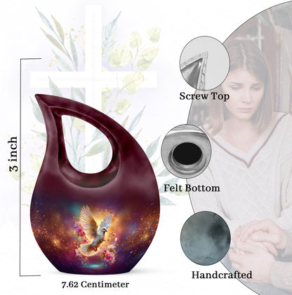 Icy Blue Dove Cremation Urn back view with polished surface - sacred cross merged with dove motif on metal - mini keepsake memorial for portion of cremation ashes