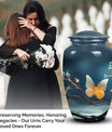 Elegant butterfly urn in metal custom designed for preserving adult female ashes, a unique and personalized tribute for mom