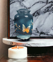 Elegant butterfly urn in metal custom designed for preserving adult female ashes, a unique and personalized tribute for mom