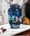 Elegant butterfly-themed funeral urn used for burial in ground, serving as a secure ash holder for human ashes