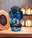 Elegant butterfly-themed funeral urn used for burial in ground, serving as a secure ash holder for human ashes