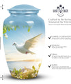 Image of dove-designed metal urn for human ashes, an elegant funerary urn suitable for adult men