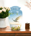 Image of dove-designed metal urn for human ashes, an elegant funerary urn suitable for adult men
