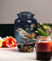 Sparrow design cremation urn, ideal for preserving adult female and male ashes.