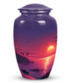 Large purple Sunset Urn of aluminium, measures 10 inches high and 7 inches in diameter with customization of engraved names. Package includes velvet pouch and handling instructions.