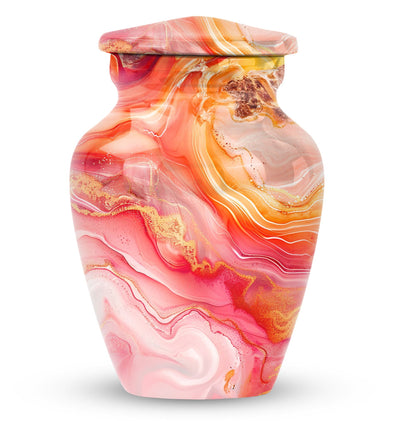 A 10 inch Vibrant Swirl memorial urn for burial, with an aluminimum finish in an abstract design