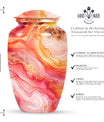 A 10 inch Vibrant Swirl memorial urn for burial, with an aluminimum finish in an abstract design