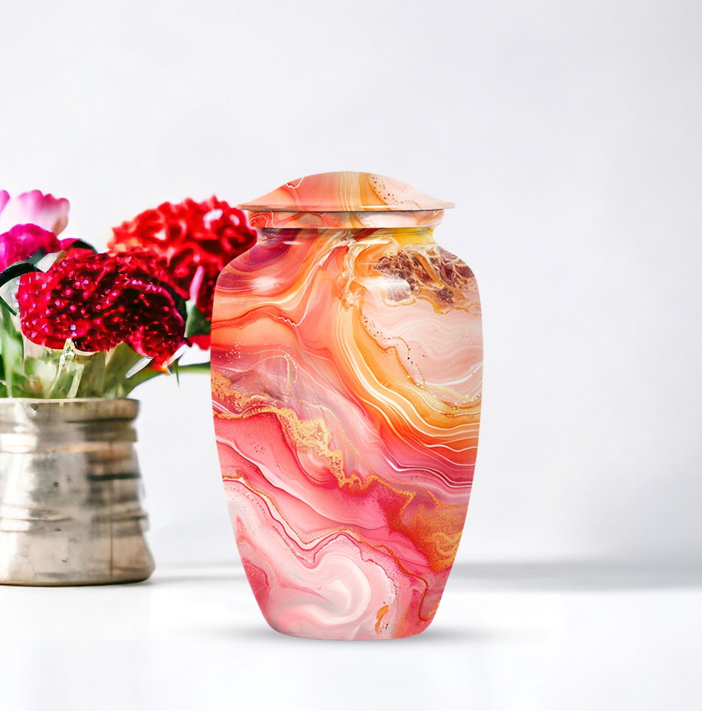 A 10 inch Vibrant Swirl memorial urn for burial, with an aluminimum finish in an abstract design