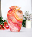 A 10 inch Vibrant Swirl memorial urn for burial, with an aluminimum finish in an abstract design