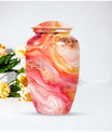 A 10 inch Vibrant Swirl memorial urn for burial, with an aluminimum finish in an abstract design