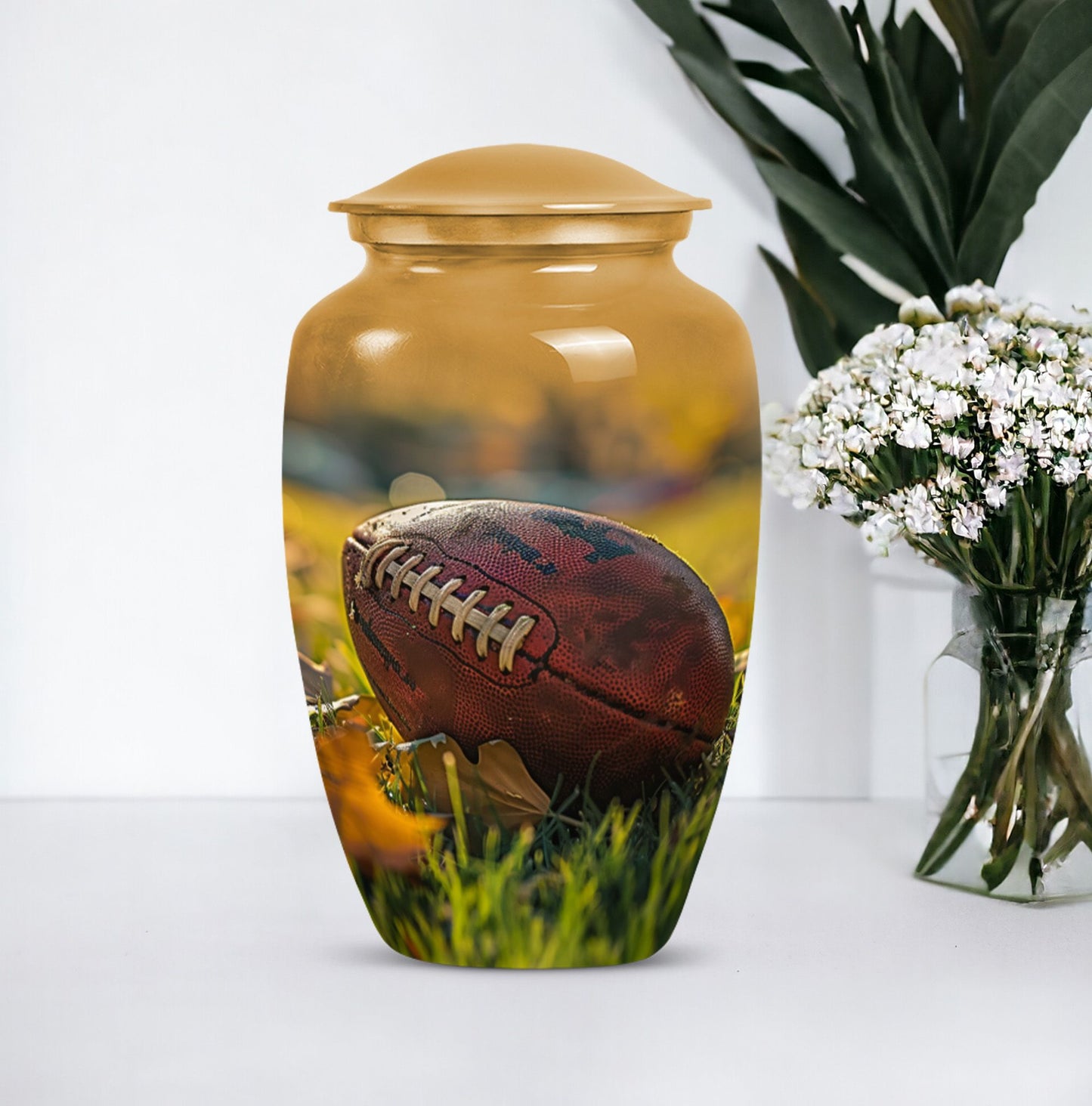 10-inch classic football urn made of aluminium.