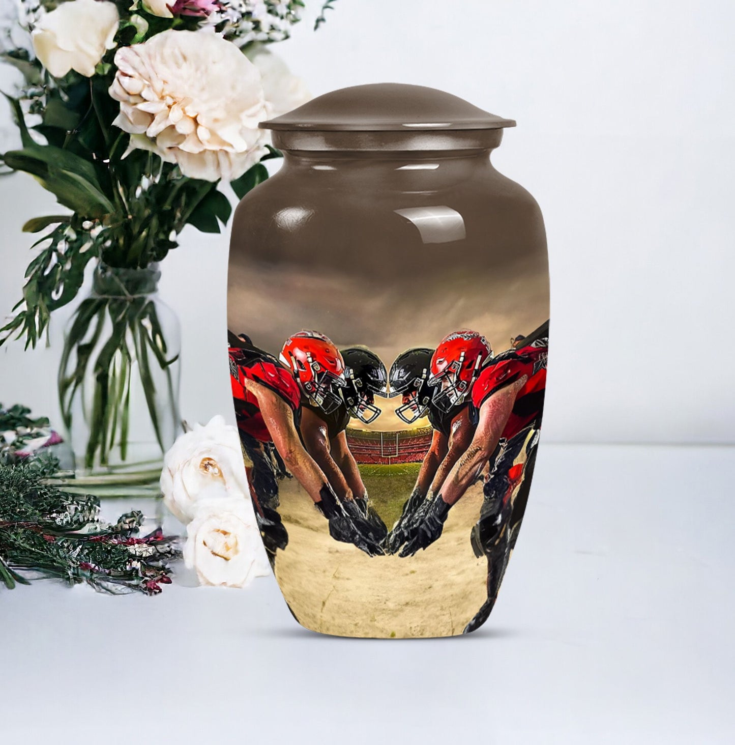 10-inch classic football urn made of aluminum for human ashes.