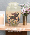 urn portraying a moose walking