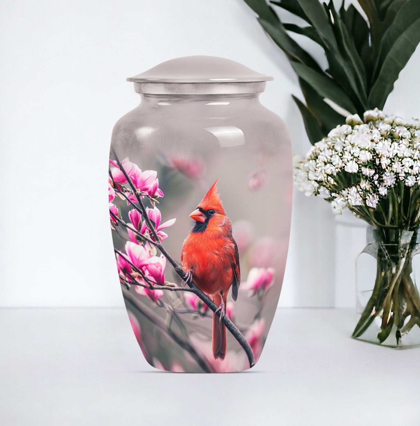 Classic cardinal bird urn with personalized engraving.