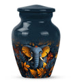 10 inch classic elephant urn with floral theme.