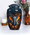 10 inch classic elephant urn with floral theme.