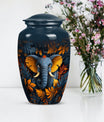 10 inch classic elephant urn with floral theme.