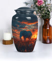 classic aluminium elephant urn with butterfly theme.