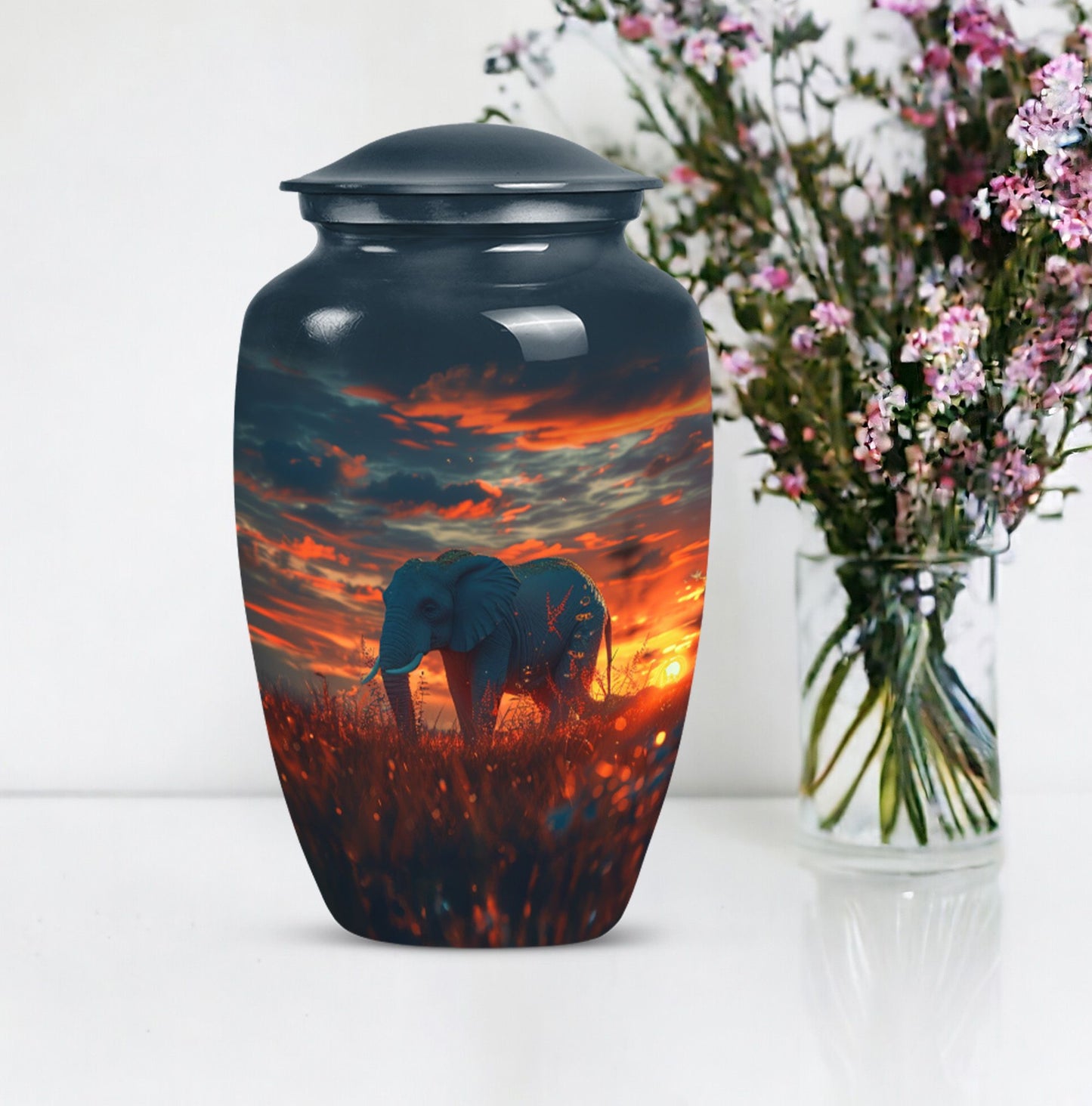 classic aluminium elephant urn with butterfly theme.