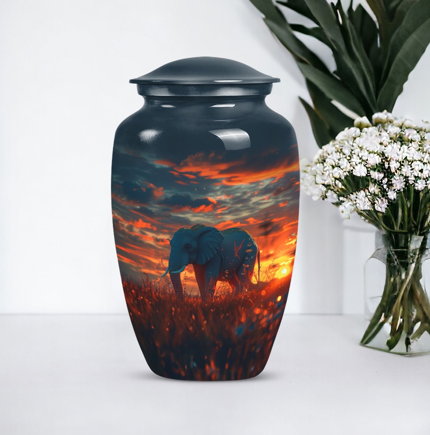 classic aluminium elephant urn with butterfly theme.