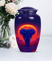 Large 10 inch classic elephant urn with butterfly design.