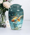 Large gold fish urn, butterfly themed