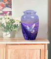 white dove on purple metal urn 