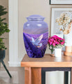 white dove on purple metal urn 