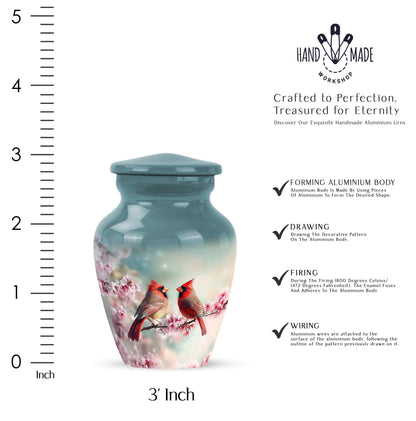 Soft Teal Cardinal Cremation Urn close-up of engraving and surface detail - timeless cardinal motif etched into premium metal - mini keepsake memorial for portion of cremation ashes