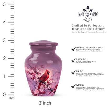 Dusty Pink Cardinal Cremation Urn close-up of engraving and surface detail - elegant classic cardinal relief with fine detailing - mini keepsake memorial for portion of cremation ashes
