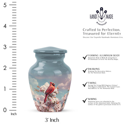 Indigo Cardinal Cremation Urn close-up of engraving and surface detail - timeless cardinal motif etched into premium metal - mini keepsake memorial for portion of cremation ashes
