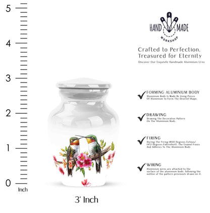 Frosted Silver Hummingbird Cremation Urn close-up of engraving and surface detail - traditional hummingbird engraving with hand-polished finish - mini keepsake memorial for portion of cremation ashes