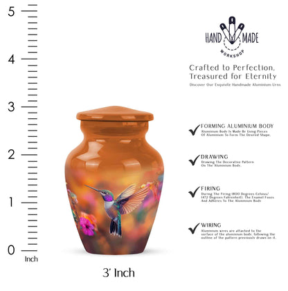 Burnished Gold Hummingbird Cremation Urn close-up of engraving and surface detail - elegant classic hummingbird relief with fine detailing - mini keepsake memorial for portion of cremation ashes