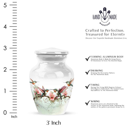 Platinum Silver Hummingbird Cremation Urn close-up of engraving and surface detail - timeless hummingbird motif etched into premium metal - mini keepsake memorial for portion of cremation ashes