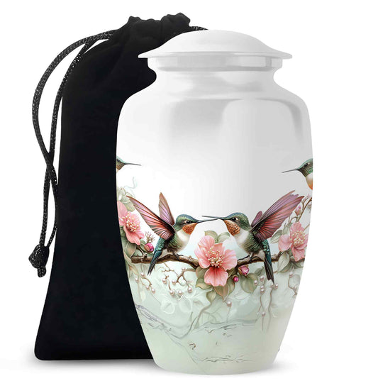 Brushed Silver Hummingbird Cremation Urn angled view of lid and engraved motif - classic sculpted hummingbird pattern on smooth aluminum - full-size 10 inch 200 cubic inch adult cremation urn