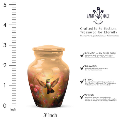 Burnished Gold Hummingbird Cremation Urn close-up of engraving and surface detail - traditional hummingbird engraving with hand-polished finish - mini keepsake memorial for portion of cremation ashes