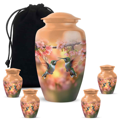 Gilded Gold Hummingbird Cremation Urn top-down view of secure threaded lid - classic sculpted hummingbird pattern on smooth aluminum - memorial set with one large and four small urns