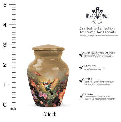 Warm Gold Hummingbird Cremation Urn close-up of engraving and surface detail - traditional hummingbird engraving with hand-polished finish - mini keepsake memorial for portion of cremation ashes