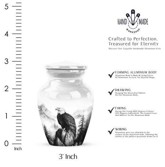 Gleaming Silver Eagle Cremation Urn close-up of engraving and surface detail - classic sculpted eagle pattern on smooth aluminum - mini keepsake memorial for portion of cremation ashes