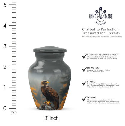 Deep Black Eagle Cremation Urn close-up of engraving and surface detail - classic sculpted eagle pattern on smooth aluminum - mini keepsake memorial for portion of cremation ashes