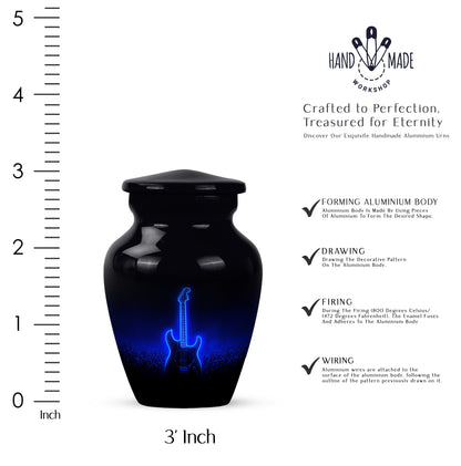 Deep Black Guitar Cremation Urn close-up of engraving and surface detail - classic sculpted guitar pattern on smooth aluminum - mini keepsake memorial for portion of cremation ashes