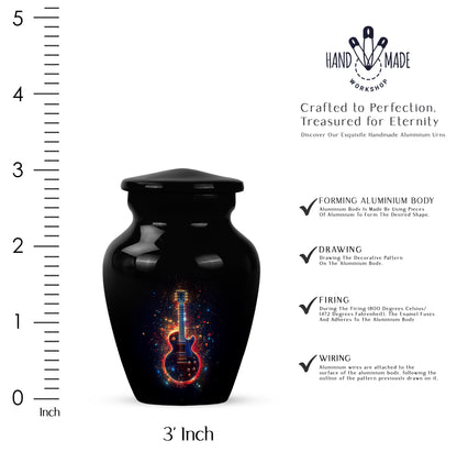 Jet Black Guitar Cremation Urn close-up of engraving and surface detail - classic sculpted guitar pattern on smooth aluminum - mini keepsake memorial for portion of cremation ashes
