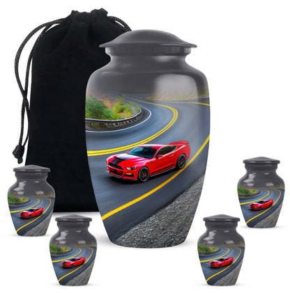 Deep Black Car Cremation Urn top-down view of secure threaded lid - classic sculpted car pattern on smooth aluminum - memorial set with one large and four small urns