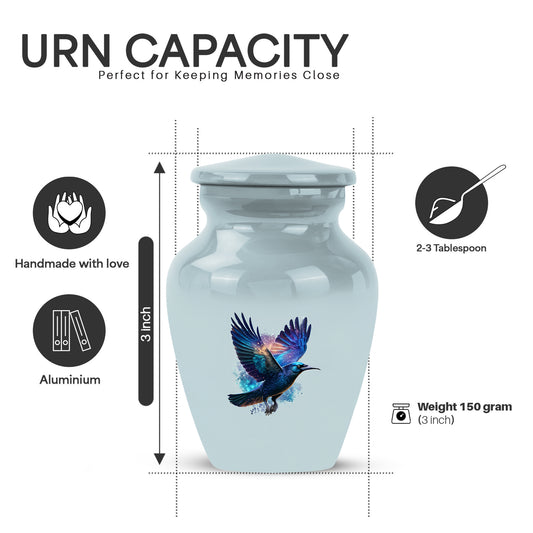 Gleaming Silver Crow Cremation Urn close-up of engraving and surface detail - timeless crow motif etched into premium metal - mini keepsake memorial for portion of cremation ashes