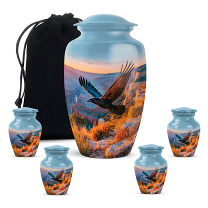 Icy Blue Crow Cremation Urn top-down view of secure threaded lid - timeless crow motif etched into premium metal - memorial set with one large and four small urns