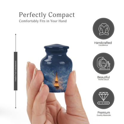 Powder Blue Eiffel Tower Cremation Urn close-up of engraving and surface detail - classic sculpted eiffel tower pattern on smooth aluminum - mini keepsake memorial for portion of cremation ashes
