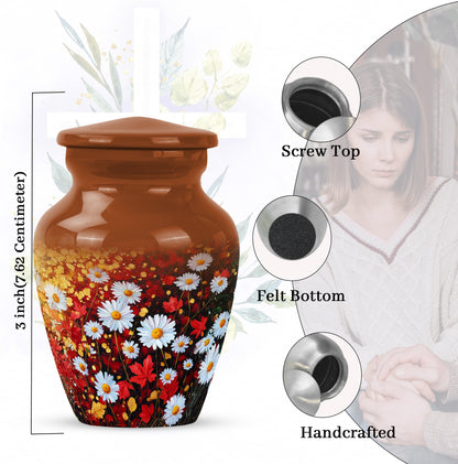 Warm Gold Daisy Cremation Urn close-up of engraving and surface detail - traditional daisy engraving with hand-polished finish - mini keepsake memorial for portion of cremation ashes