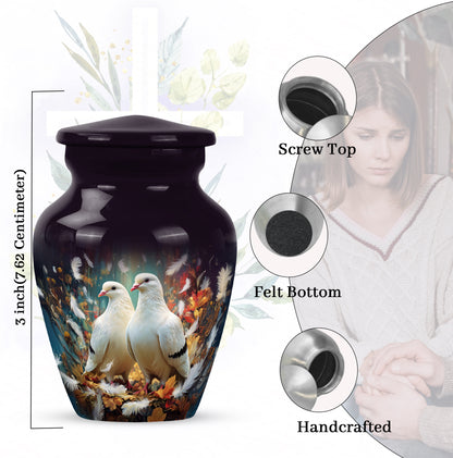 Glossy Black Dove Cremation Urn close-up of engraving and surface detail - classic sculpted dove pattern on smooth aluminum - mini keepsake memorial for portion of cremation ashes