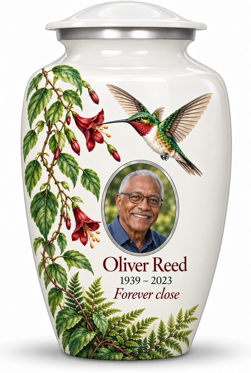 White hummingbird adult urn with red hanging flowers and green fern leaves and Oliver Reed sample portrait and personalized text