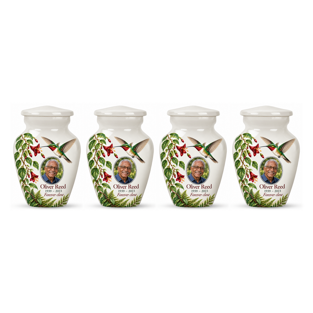 Four matching white hummingbird keepsake urns with Oliver Reed sample photo and text